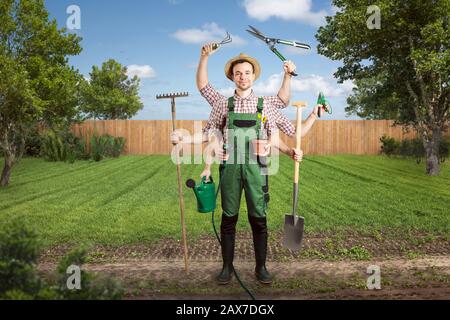 Motivated gardener with multiple arms and tools Stock Photo