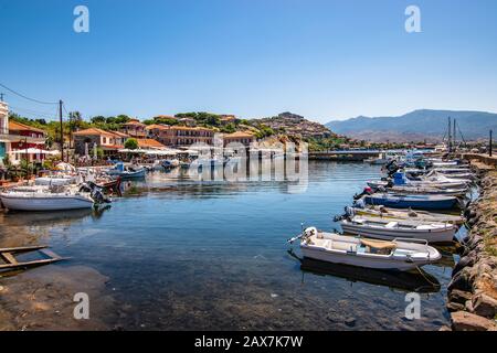 Marina with small motorized boats at the Molyvos harbor of Mithymna (Lesbos). Stock Photo