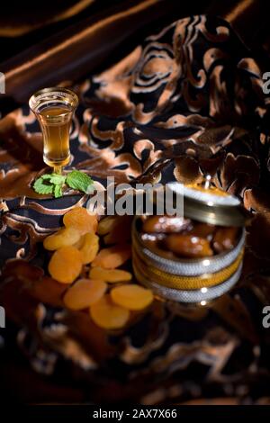 After meal Arabian delicacies, dates & Gawa (Arabian coffee). Stock Photo