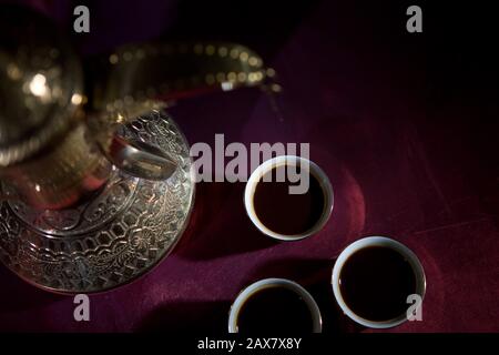 After meal Arabian delicacies, dates & gawah (Arabian coffee). Stock Photo