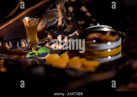 After meal Arabian delicacies, dates & Gawa (Arabian coffee). Stock Photo