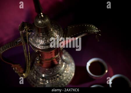 After meal Arabian delicacies, dates & gawah (Arabian coffee). Stock Photo