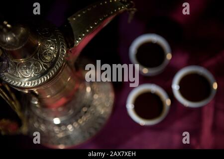 After meal Arabian delicacies, dates & gawah (Arabian coffee). Stock Photo