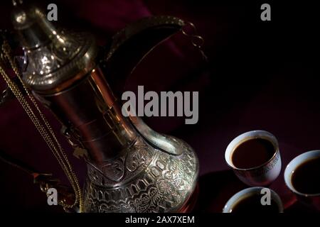 After meal Arabian delicacies, dates & gawah (Arabian coffee). Stock Photo