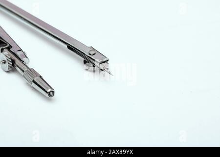 Metal compass close up on white background Stock Photo