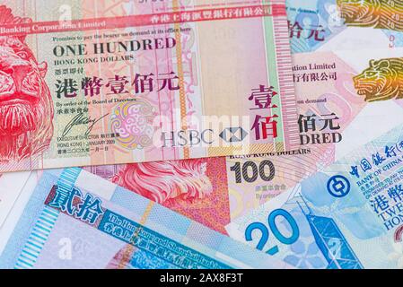 Hong Kong Currency 100, 20 and HSBC Bank Emblem in Hong Kong Stock Photo