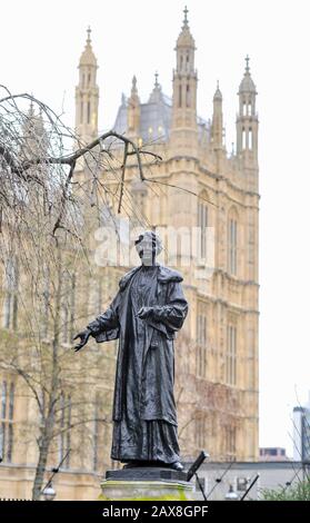 Statue of Emmeline Pankhurst outside Houses of Parliament in Westminster London . Pankhurst 1858 C 1928 was a British political activist and organizer Stock Photo