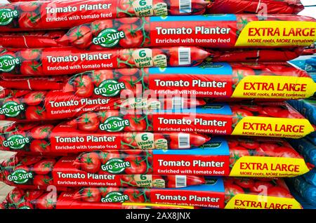 A Stack Of Large Gro Sure Tomato Planter Packs In A Garden Centre Used ...