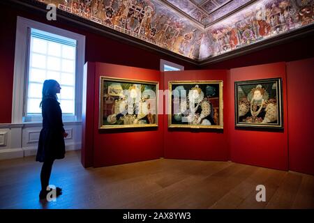 Dr Allison Goudie views the three surviving Armada portraits of Queen Elizabeth I, on display together for the first time in their 430-year history during a preview of the exhibition Faces of a Queen: The Armada Portraits of Elizabeth I at the Queen's House, Greenwich, London. PA Photo. Picture date: Tuesday February 11, 2020. Photo credit should read: Dominic Lipinski/PA Wire Stock Photo