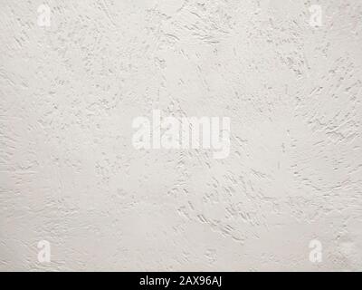 White Stucco Wall Texture Background photography .hastily hacked texture evokes continuous movement energy . material design for building exterior and Stock Photo