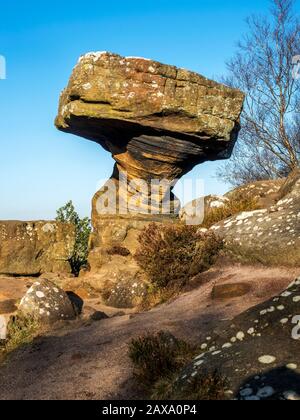 The Druids Writing Desk gritstone rock formation at Brimham Rocks Brimham Moor Nidderdale AONB North Yorkshire England Stock Photo