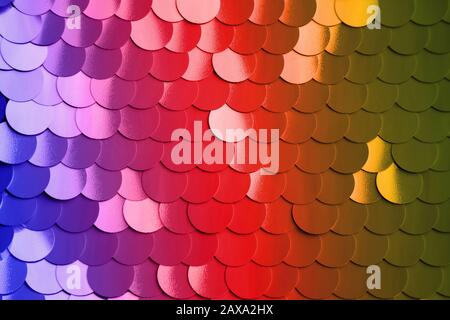 Abstract background with large round shiny sequins. Color backdrop. Modern art concept. Stock Photo