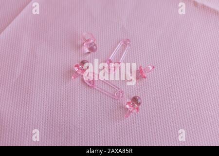 Baby Shower Table Display Pink Paper Table Cloth Plastic Dummies And Safty Pins Stock Photo Alamy