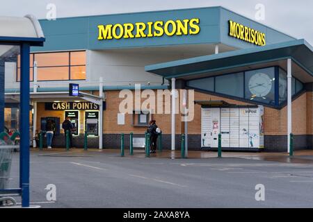 Entrance to Morrisons supermarket store with In Post Parcel Lockers Spalding, Lincolnshire, UK Stock Photo