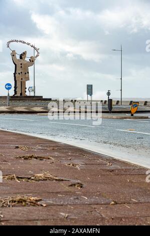 New Brighton, Wirral, UK. 11th February 2020. The aftermath of Storm Ciara continues to hit New Brighton, on the Wirral peninsula.  With strong gale force winds and flooding, the cleanup operation now begins.  Credit: Paul Warburton/Alamy Live News Stock Photo