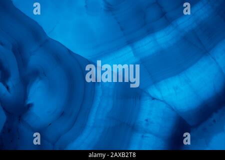 Abstract marble background in blue trendy colors. Texture of marble surface. Place for design. Close up. Color of the year 2020. Stock Photo