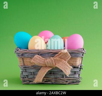 Easter spring daisy made of twigs with multi-colored eggs is a symbol of Christian holiday. Good card for congratulations. Stock Photo