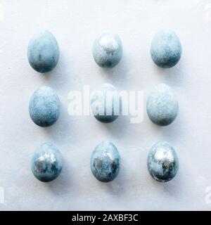 Group ombre blue Easter eggs isolated on white background. Dyed Easter eggs.Compositions in pastel colors. Easter consept. Flat lay, top view. Copy space. Stylish Set of 9 blue Stock Photo