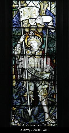 A stained glass window by C E Kempe & Co. Ltd. depicting St Michael Archangel, All Saints Church, Braunston, Rutland Stock Photo