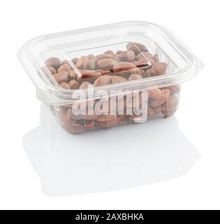 peanuts groundnuts in a transparent plastic container isolated on a white background with clipping path Stock Photo