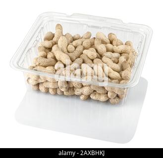 peanuts groundnuts in a transparent plastic box isolated on a white background with clipping path Stock Photo