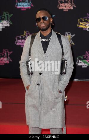 Dadju on the red carpet before the 2019 NRJ Music Awards ceremony in Cannes (south-eastern France), at the “Palais des Festivals” convention center on Stock Photo