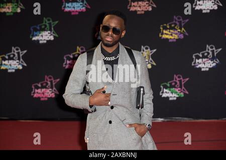 Dadju on the red carpet before the 2019 NRJ Music Awards ceremony in Cannes (south-eastern France), at the “Palais des Festivals” convention center on Stock Photo