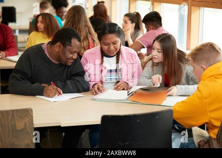 College students studying in classroom Stock Photo