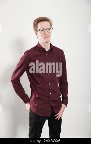 Portrait confident young man looking away Stock Photo