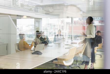 Business people talking in conference room meeting Stock Photo