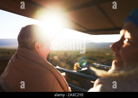 Happy senior women riding in safari off-road vehicle Stock Photo