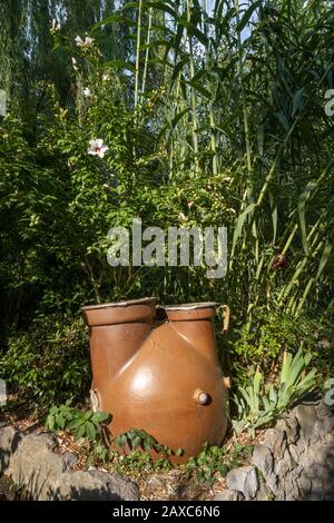 A large clay vessel for collecting water and watering plants at Chekhov's dacha in Yalta. Stock Photo