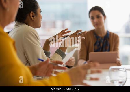 Businesswoman explaining in conference room meeting Stock Photo