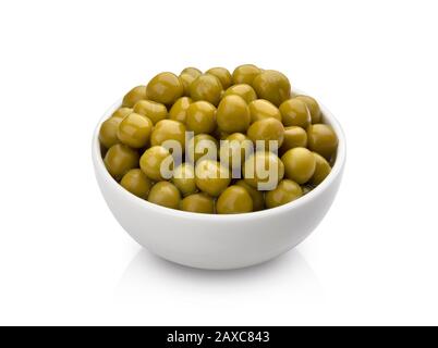 Canned green peas in bowl isolated on white background with clipping path Stock Photo