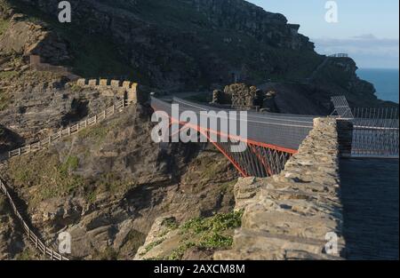 Steel Cantilever Footbridge Linking The Ruins of Tintagel Castle to the Village of Tintagel on the North Cornish Coast in Cornwall, England, UK Stock Photo