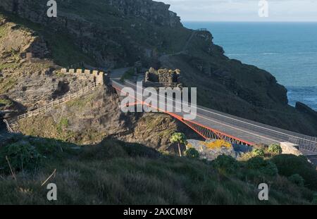 Steel Cantilever Footbridge Linking The Ruins of Tintagel Castle to the Village of Tintagel on the North Cornish Coast in Cornwall, England, UK Stock Photo