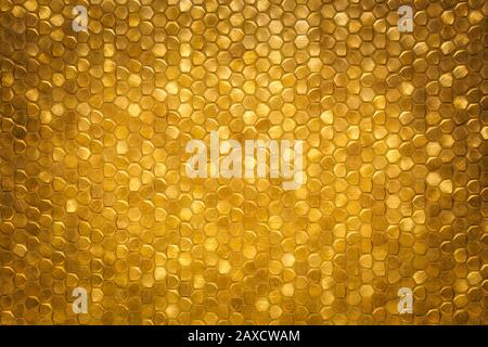Gold sparkling little tiled wall background texture, modern luxury rich shiny mosaic pattern Stock Photo