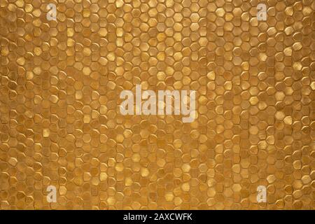 Gold sparkling little tiled wall background texture, modern luxury rich shiny mosaic pattern Stock Photo