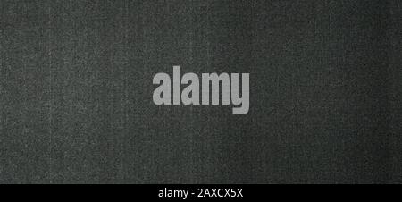 grunge dark grey dotted halftone pattern printed on paper useful as a background Stock Photo