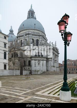 Lanterns in front of Santa Maria della Salute in Venice (Italy) Stock Photo