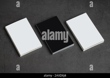 Empty business cards. Mockup for branding identity on dark stone background Stock Photo