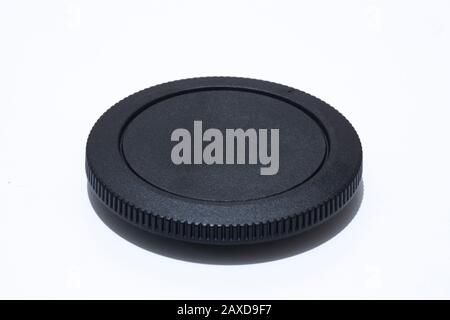 Camera body cap close-up. In white background. Stock Photo