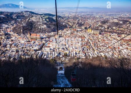 Brasov rooftops in winter from Mountain Tampa, Transylvania, Romania Stock Photo