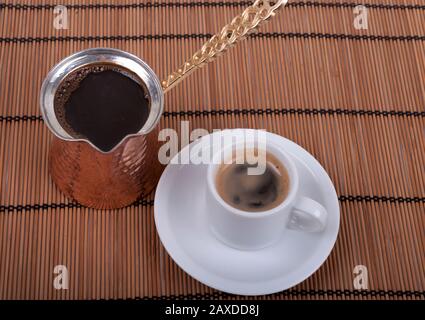cup of coffee served in a cezve Stock Photo