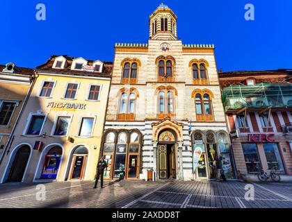 BRASOV, ROMANIA - February 9, 2020. Facade of the Holy Assumption Church of Our Lady in the Council Square of Brasov Old Town, Romania Stock Photo