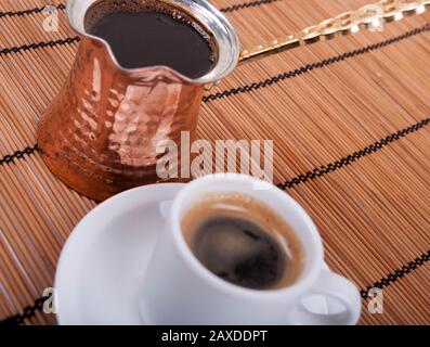 cup of coffee served in a cezve Stock Photo