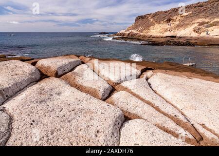 Volcanic rock shoreline at La Caleta, Tenerife, Canary Islands Stock Photo