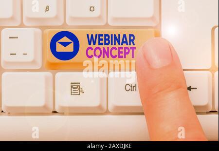 Conceptual hand writing showing Webinar Concept. Concept meaning workshop or seminar that is transmitted over the Web Stock Photo
