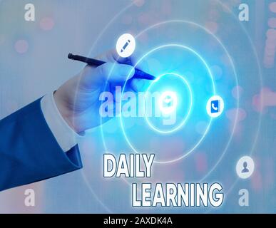 Conceptual hand writing showing Daily Learning. Concept meaning The everyday acquisition of knowledge or skills acquired Stock Photo