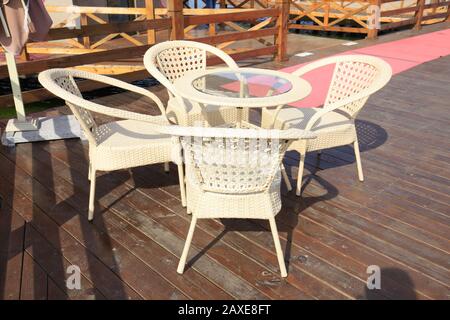 Desks and chairs in the sun Stock Photo